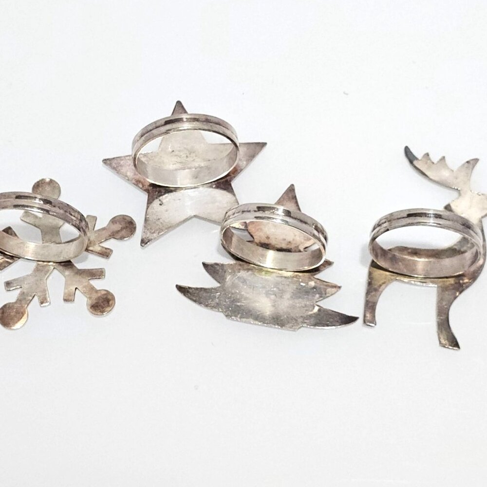 4 Vintage Christmas Napkin Rings Snowflake Star Tree Deer Design silvertone - Picture 3 of 6